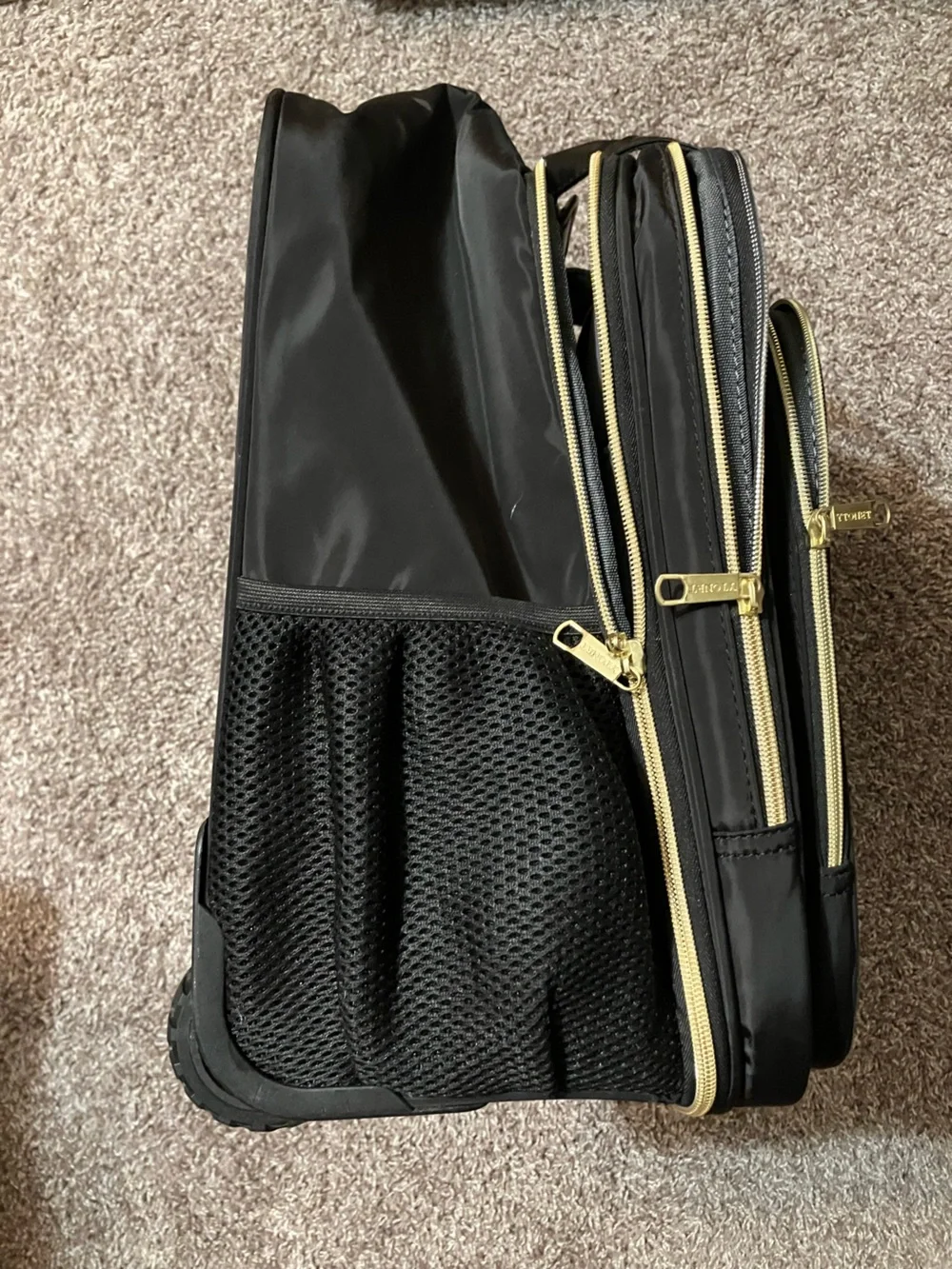 Quilted Black Rolling Travel Tote with Gold Accents